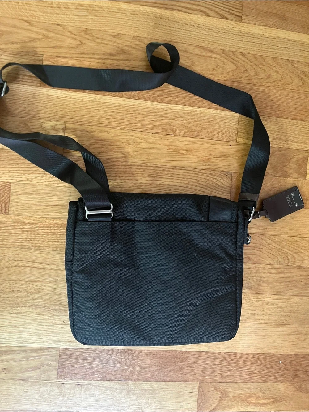 Tumi Black Messenger Bag with Brown Accents